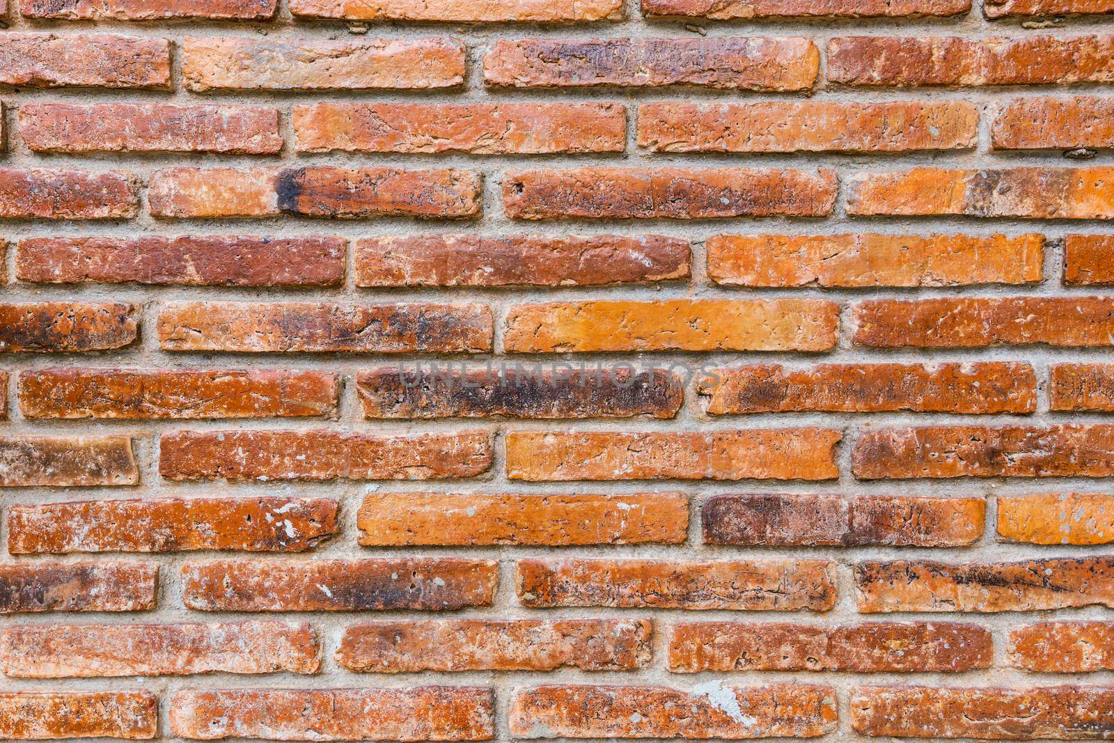 The Old red brick wall background texture close up