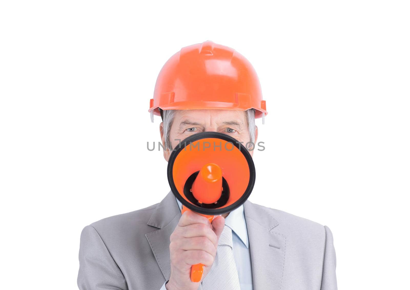 closeup.senior engineer with a megaphone.isolated on white.photo with copy space