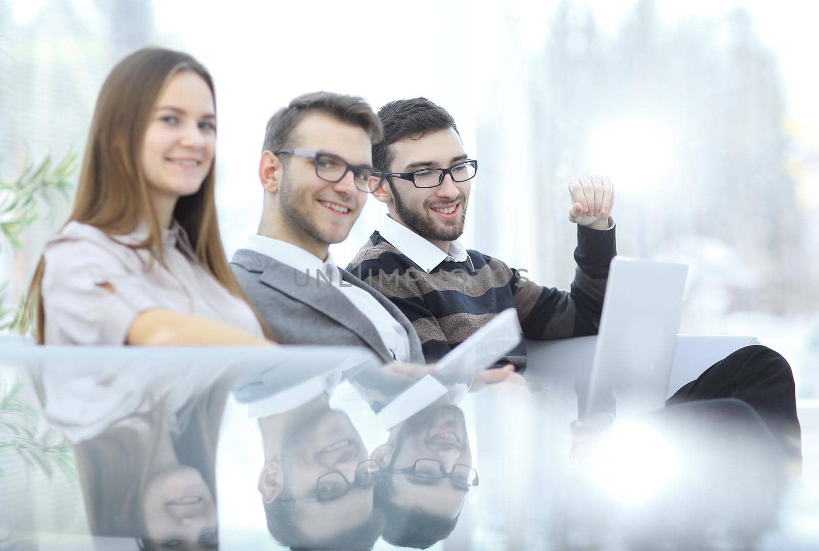 close up.business colleagues in the workplace in the office.photo with copy space