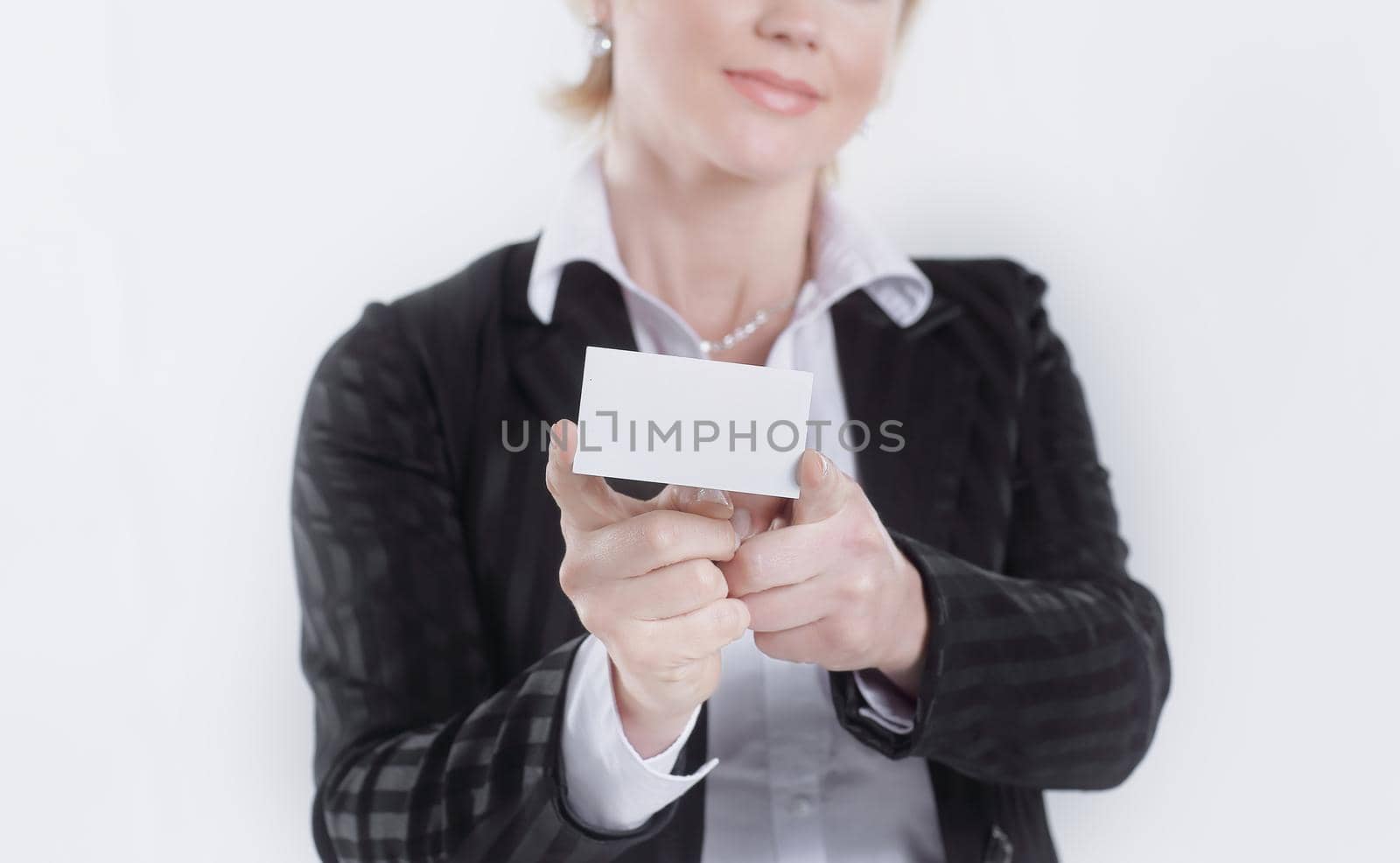 successful business woman showing blank credit card .isolated on white .