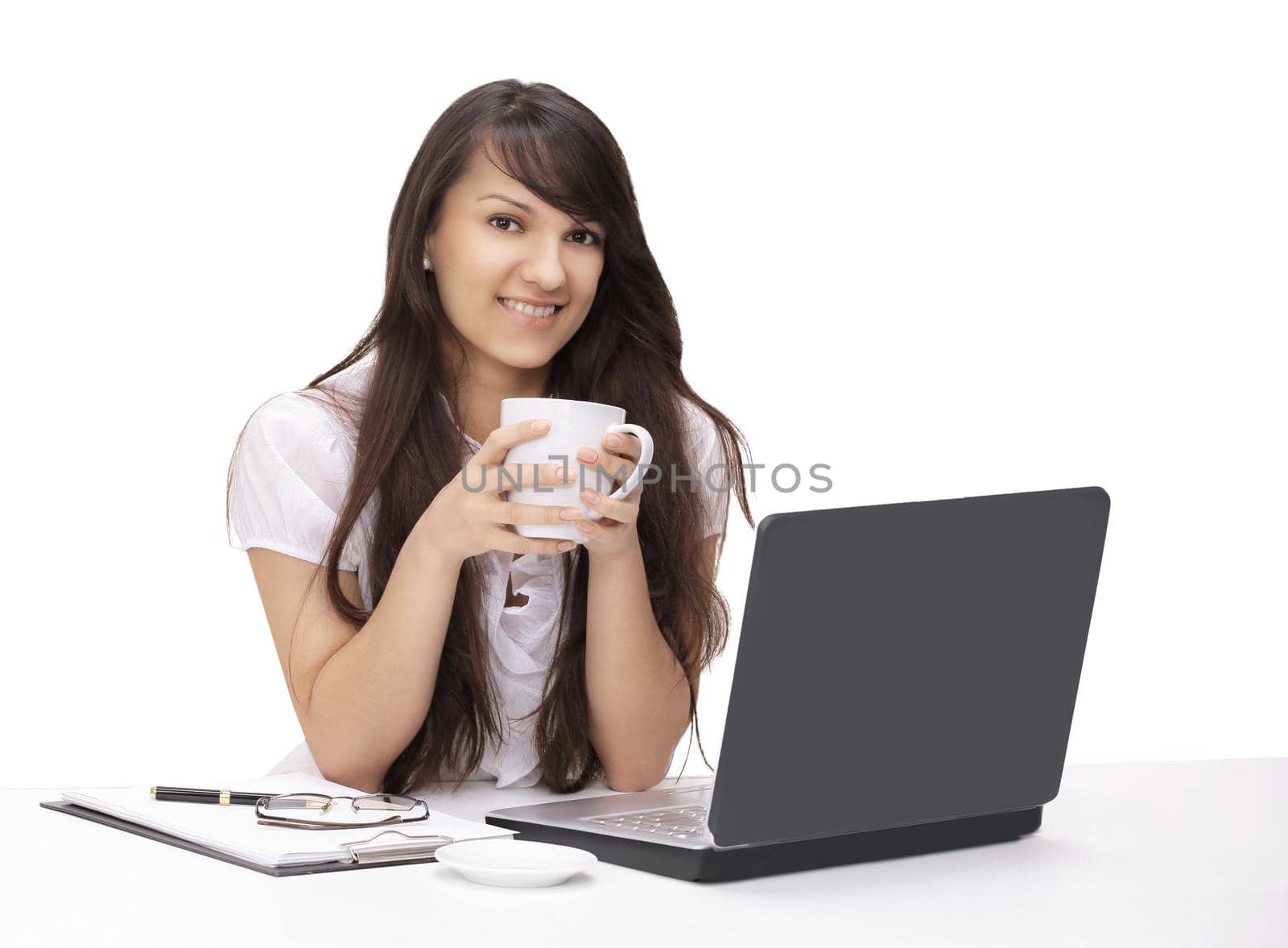 closeup.young woman with Cup of tea sitting in the workplace.isolated on white