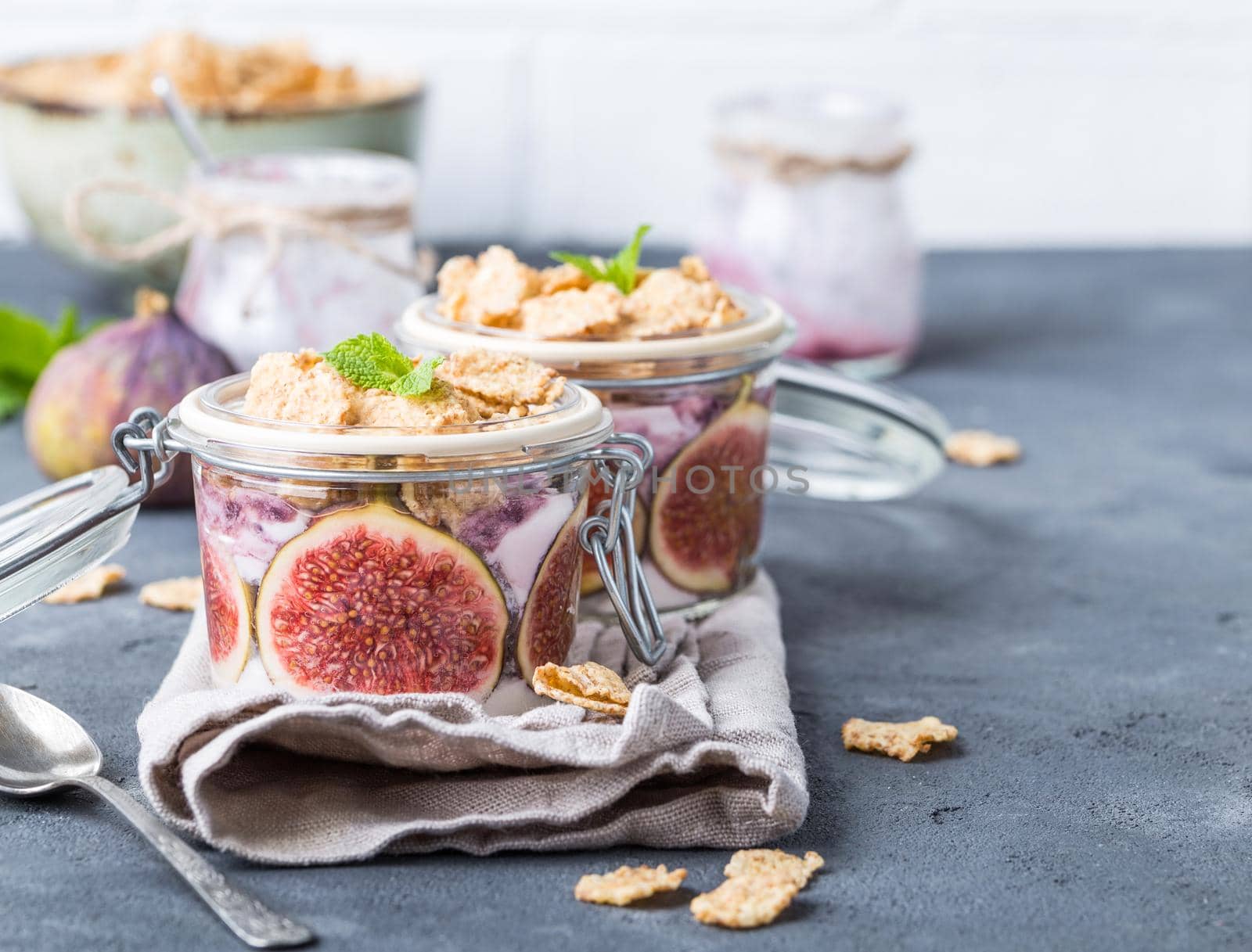 Yoghurt in jar with muesli by its_al_dente