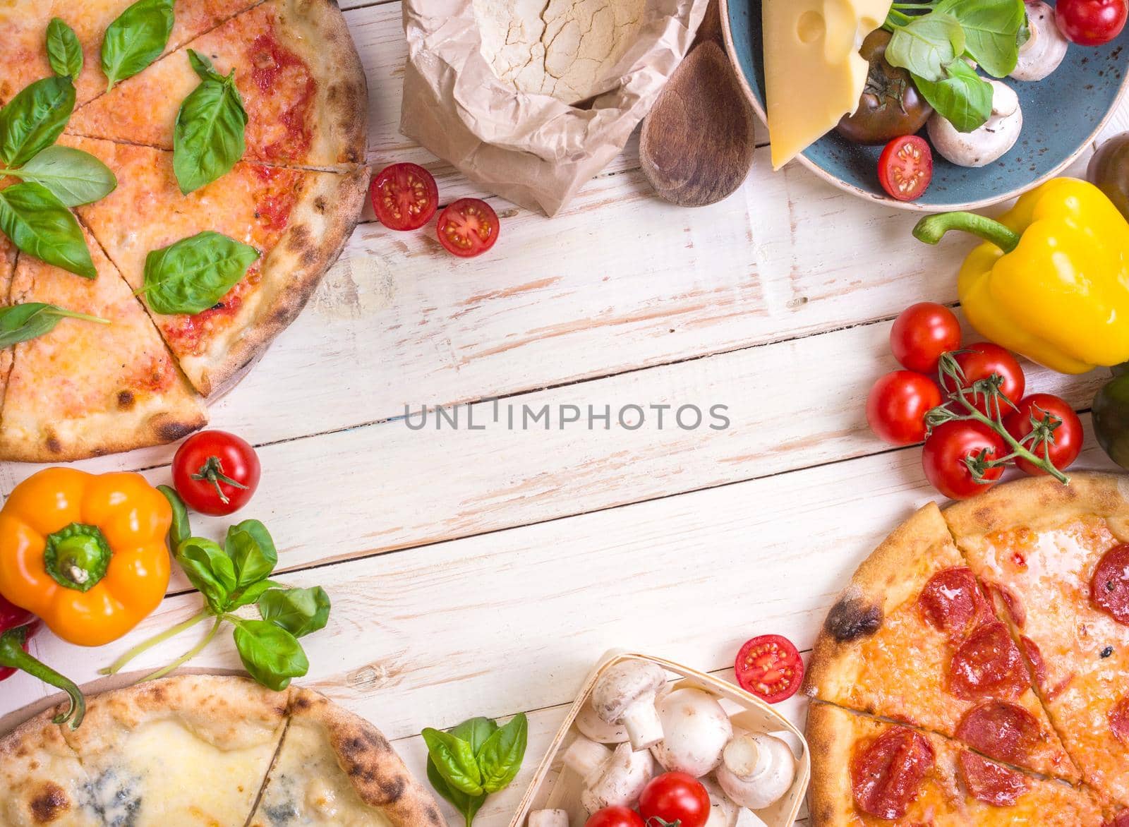 Pizza and ingredients white background by its_al_dente