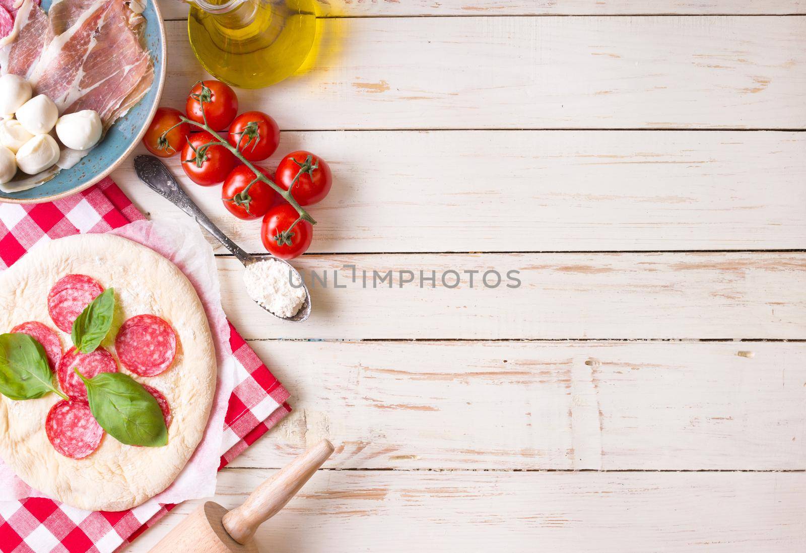 Pizza making background by its_al_dente