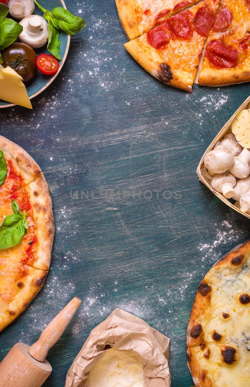 Pizza and ingredients background by its_al_dente