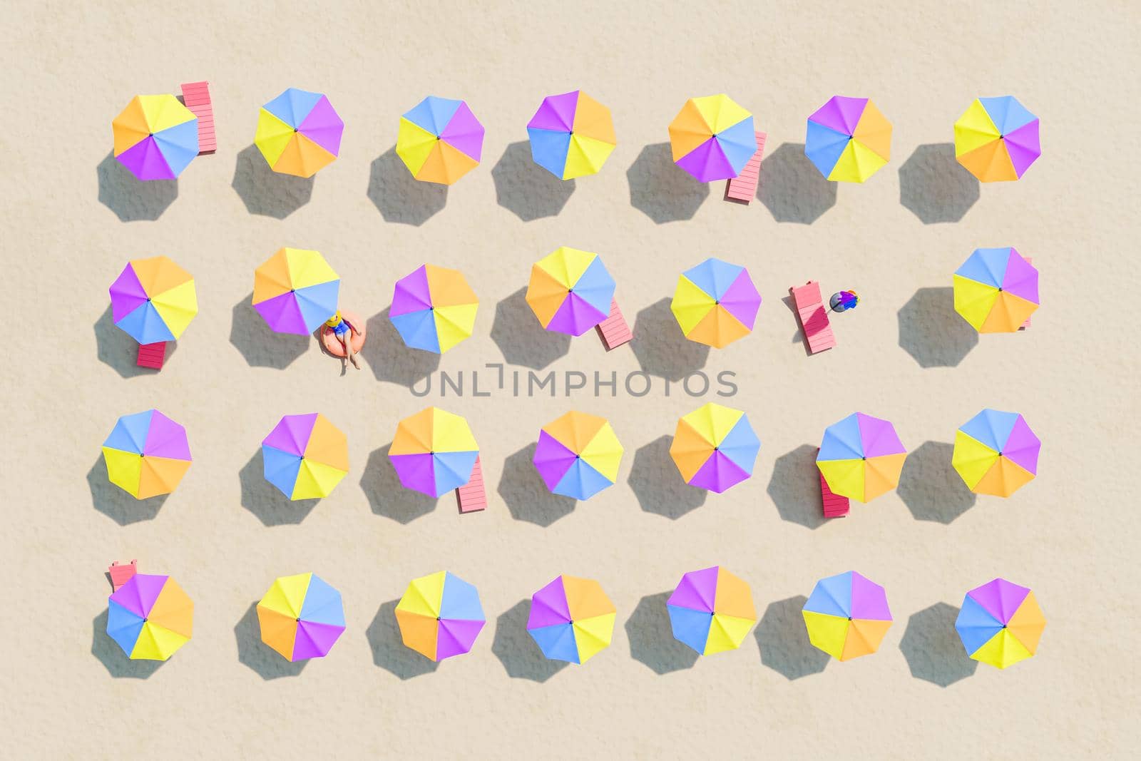 aerial view of a beach with brightly colored umbrellas and sunbeds with a person lying on an inflatable ring. 3d rendering