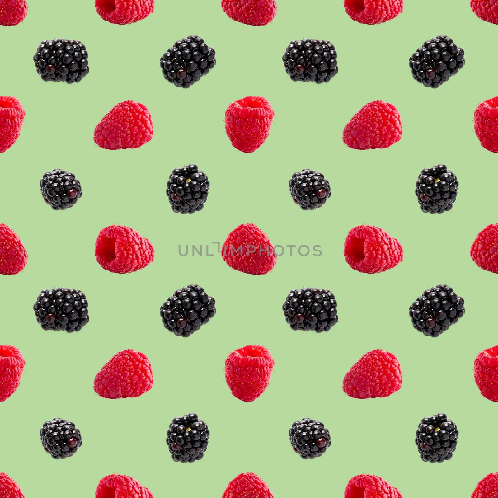 Seamless pattern with ripe raspberry and bramble. Berries abstract background. Raspberry and bramble pattern for package design with green background.