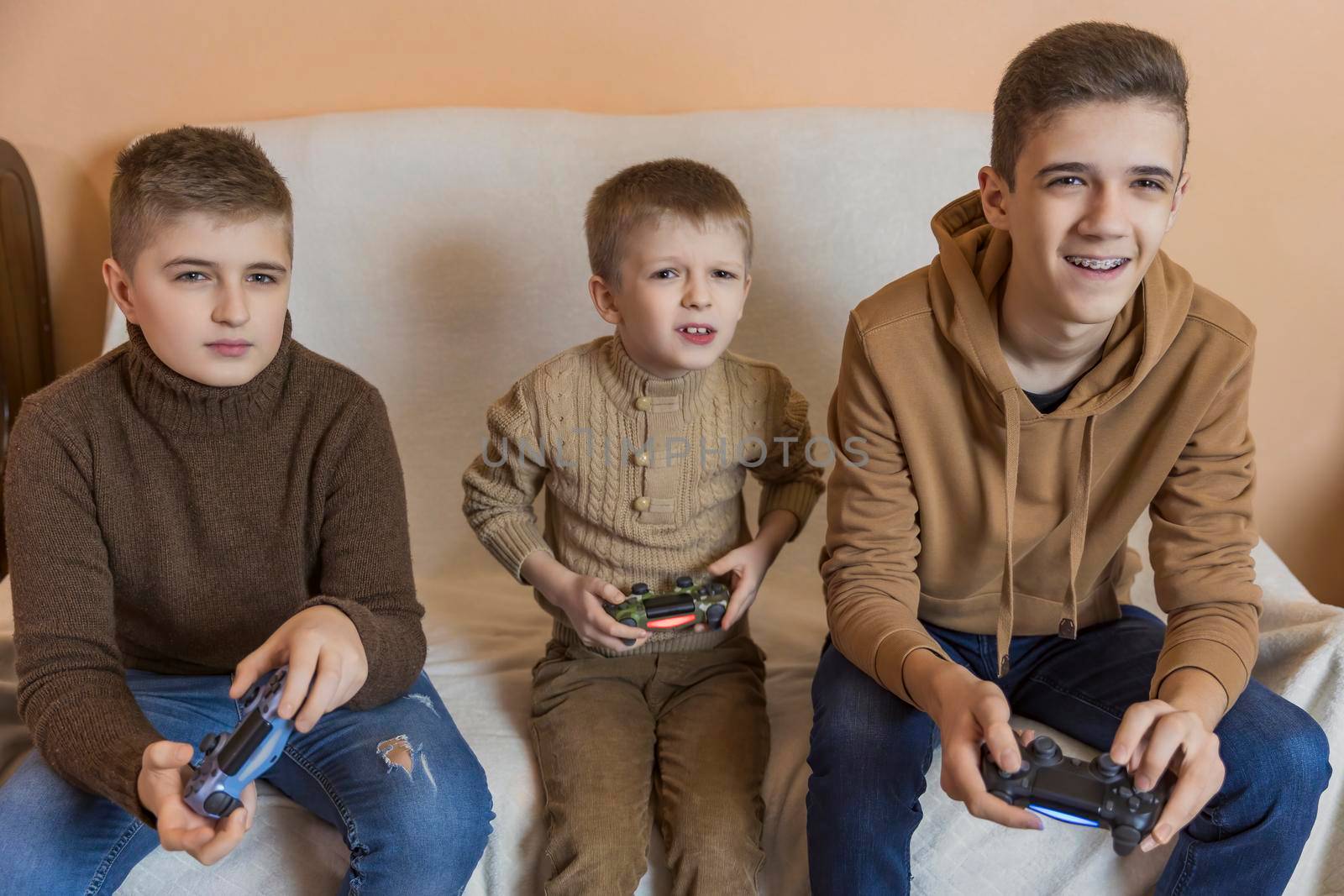 children playing console with joysticks