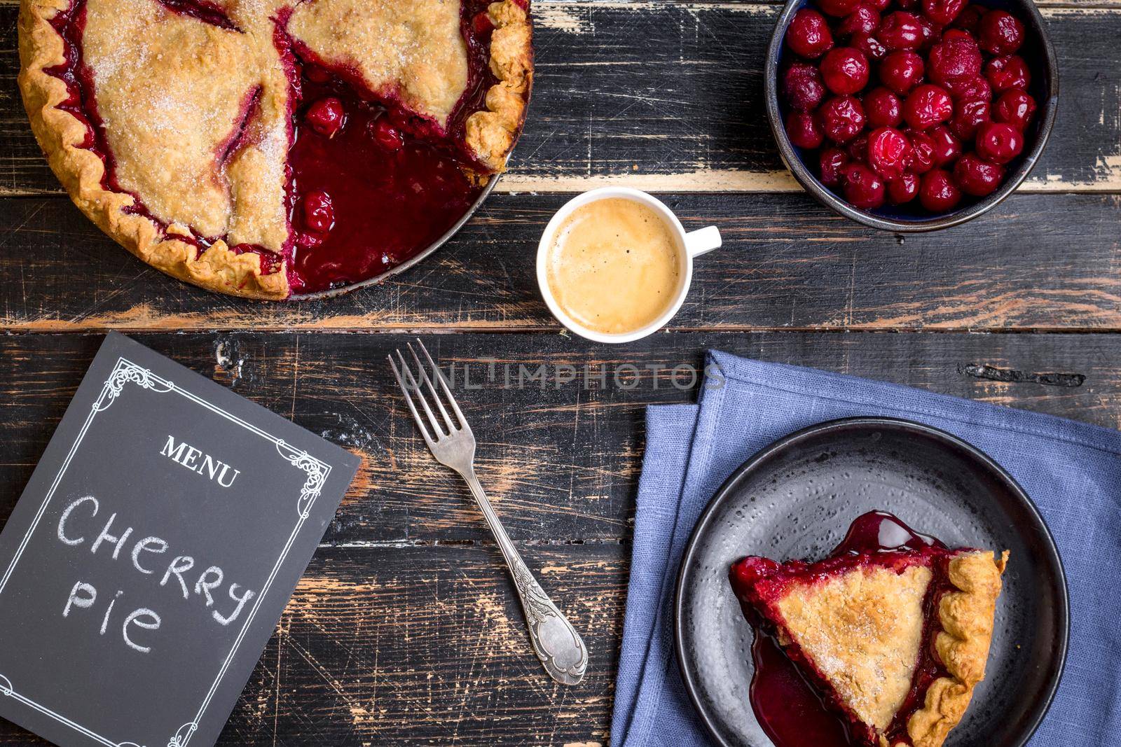 Cherry pie, cup of coffee and menu chalkboard by its_al_dente