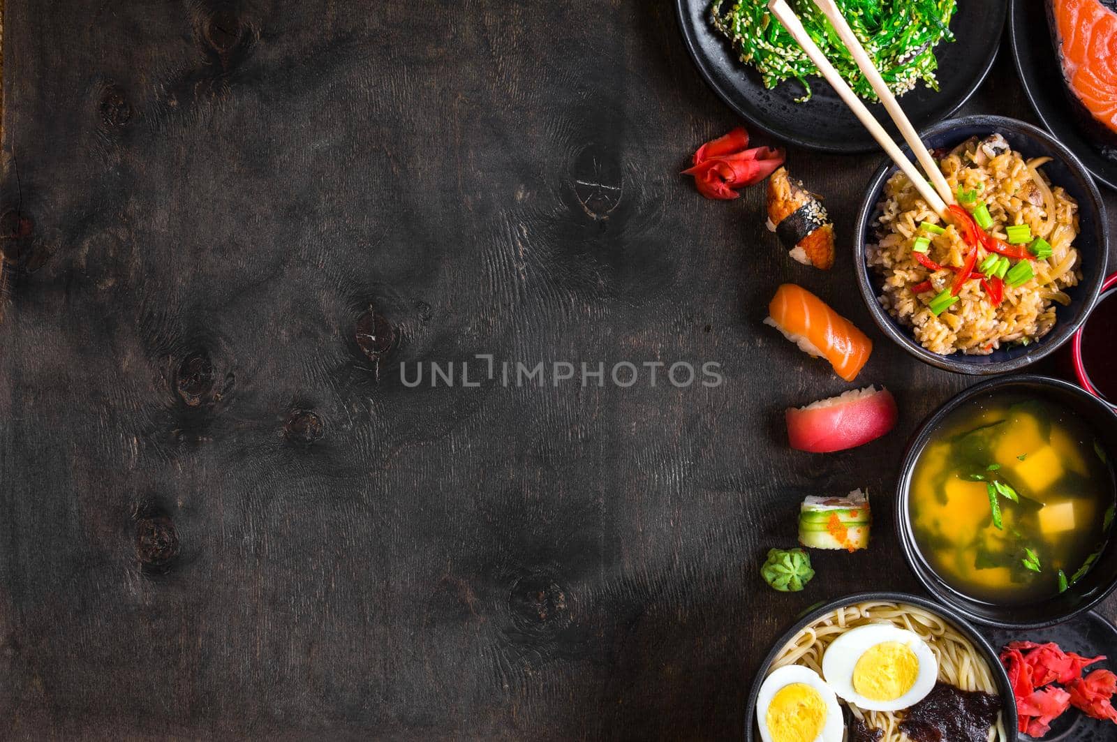 Sushi and japanese food on dark background by its_al_dente