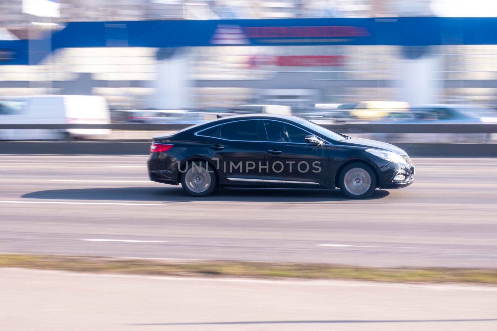 Ukraine, Kyiv - 21 March 2021: Hyundai Grandeur car moving on the street. Editorial by Yuriy_Vlasenko