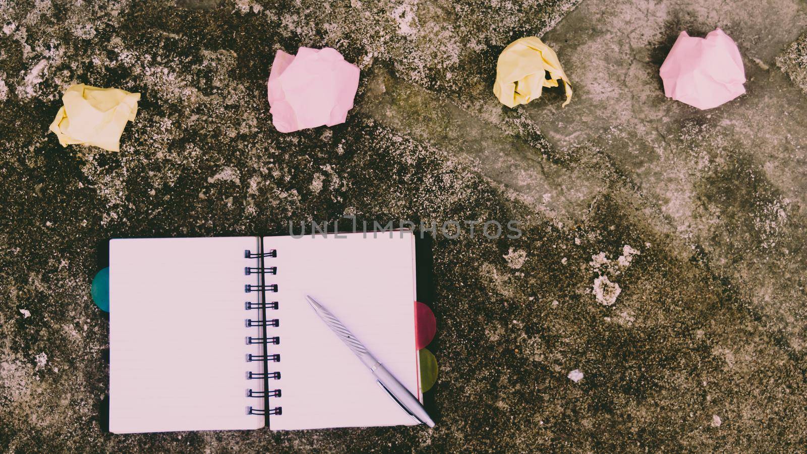 Notebook pen and crumpled paper on rustic floor. Mistake Learning, wrong, blooper, error, regret sayings background. Feelings, apology, message, love, in relationship friendship concept. Flat Lay
