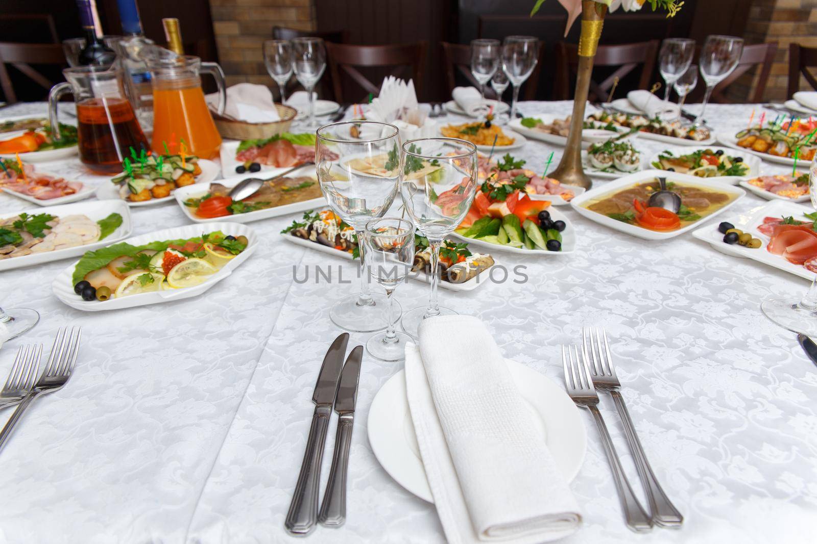 Table set for wedding or another catered event dinner. Concept: Serving. Celebration. Anniversary. Wedding