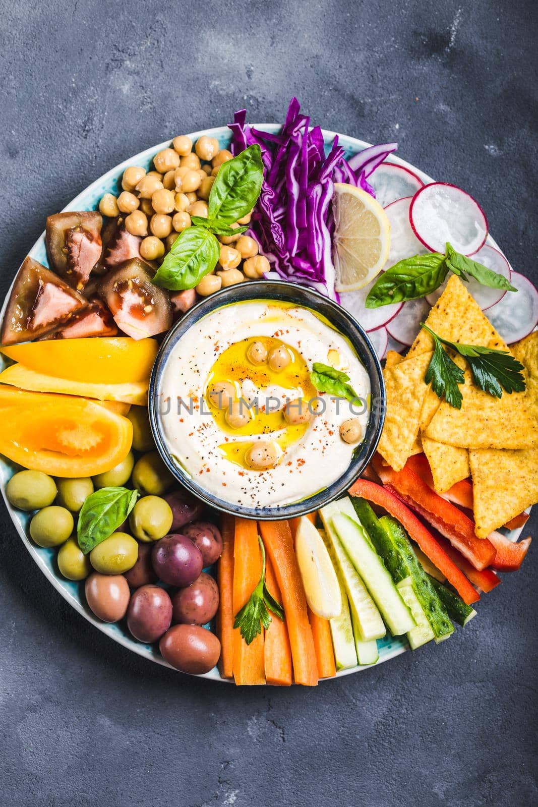 Hummus platter with assorted snacks by its_al_dente