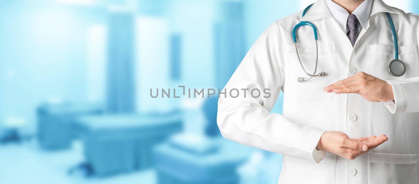 Male doctor at hospital opening hand palm to build copy space for your text and design. Medical healthcare business and doctor service.