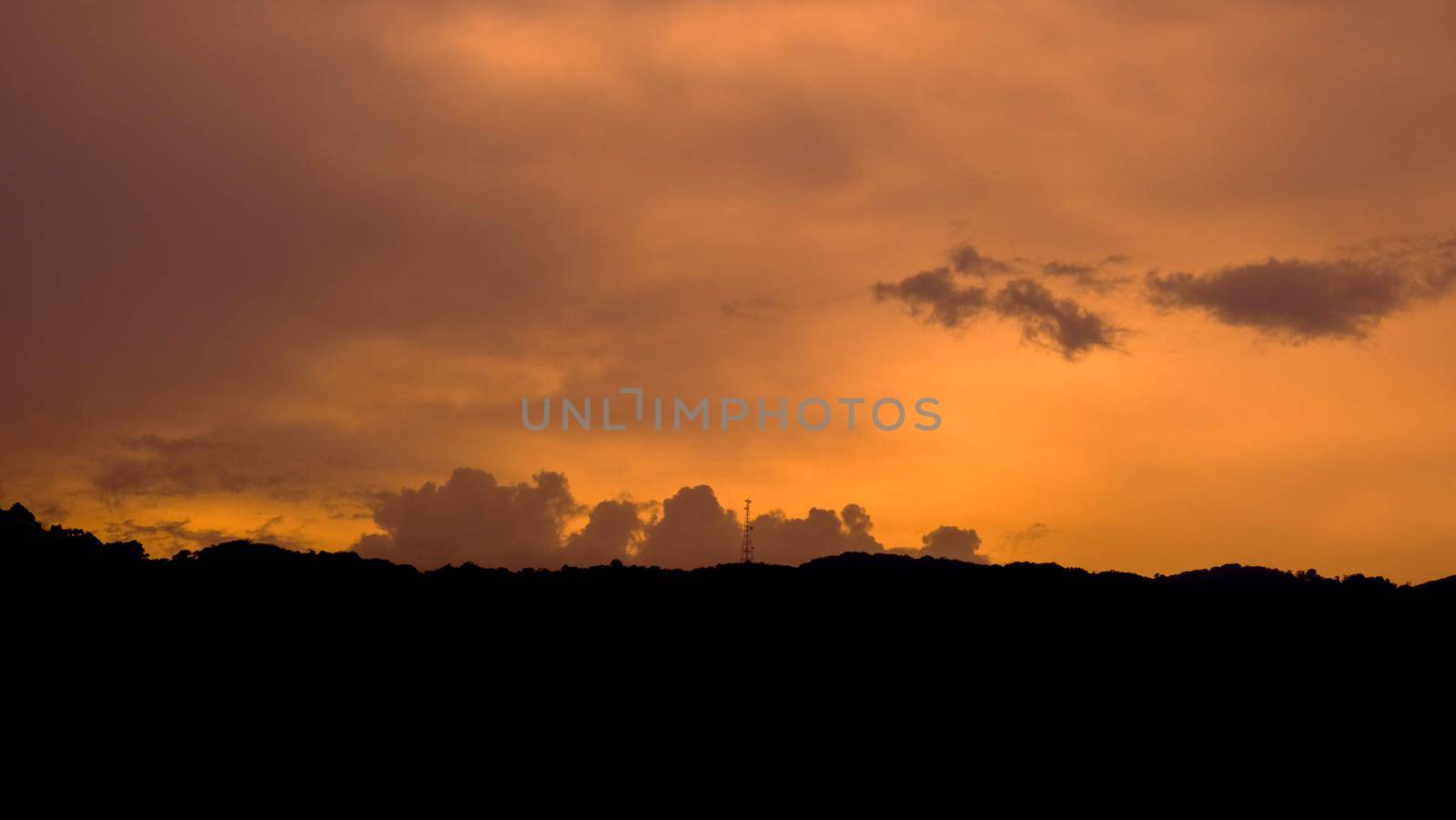 Beautiful sunset with clouds sky background. by TEERASAK