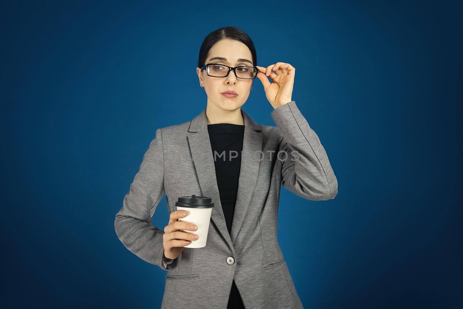 Photo of attractive business lady confident manager worker in glasses. blue color background by Rom4ek