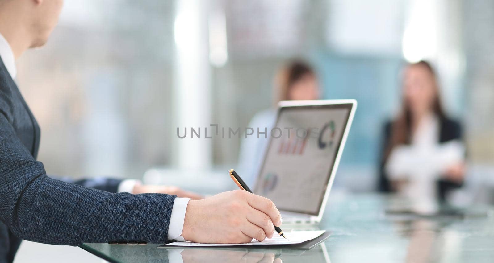 close up.businessman in the workplace in the office.