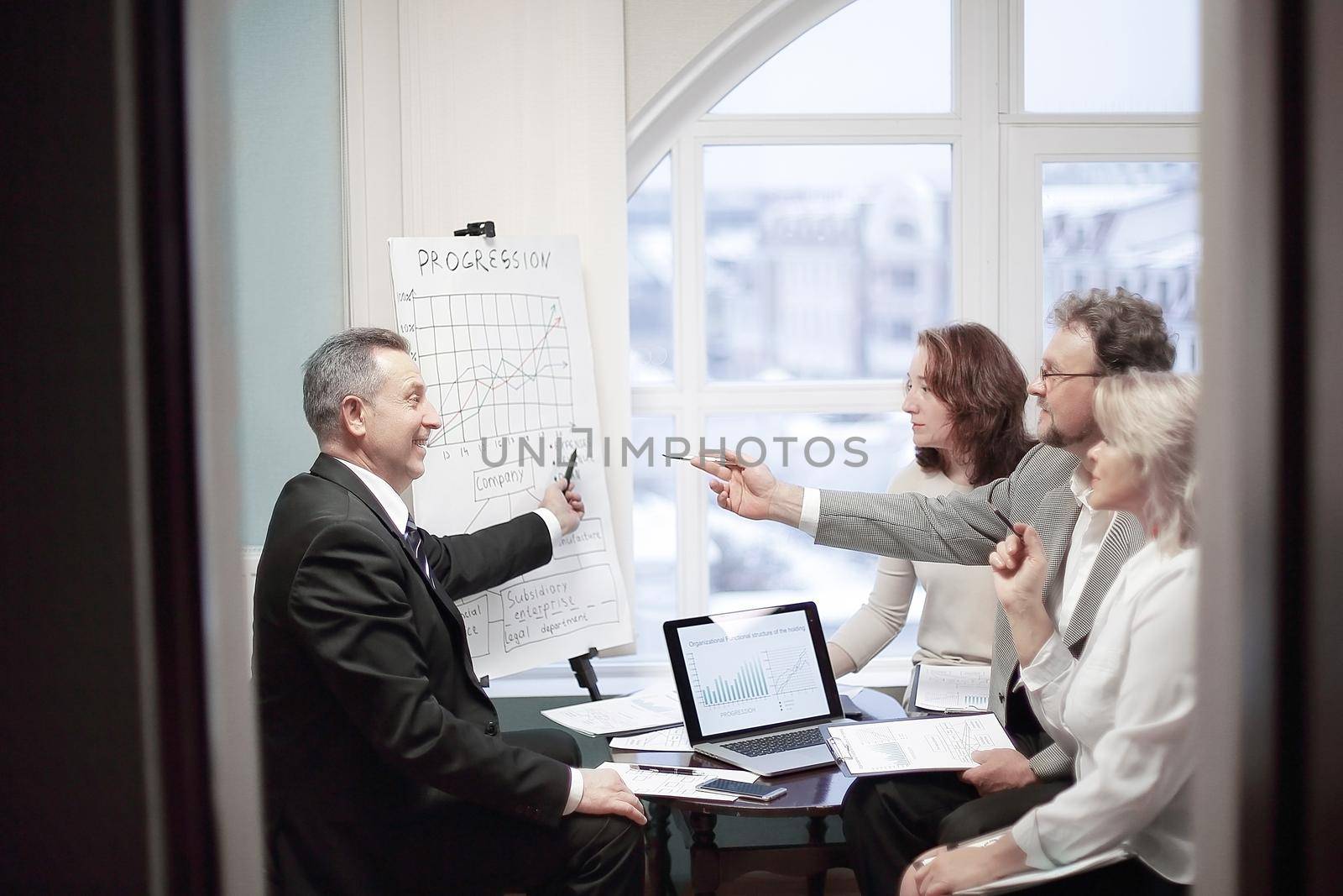group of senior businessmen discussing a new business project.the concept of partnership