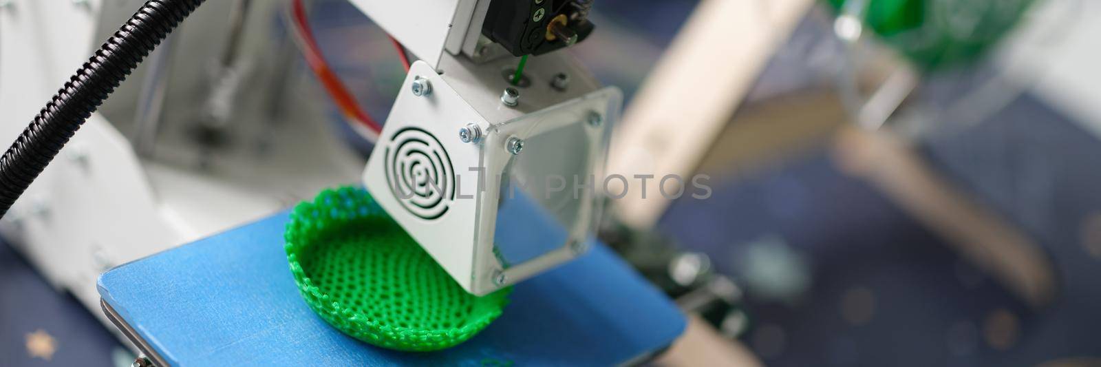 3D printer produces creates a detail for the layout by kuprevich