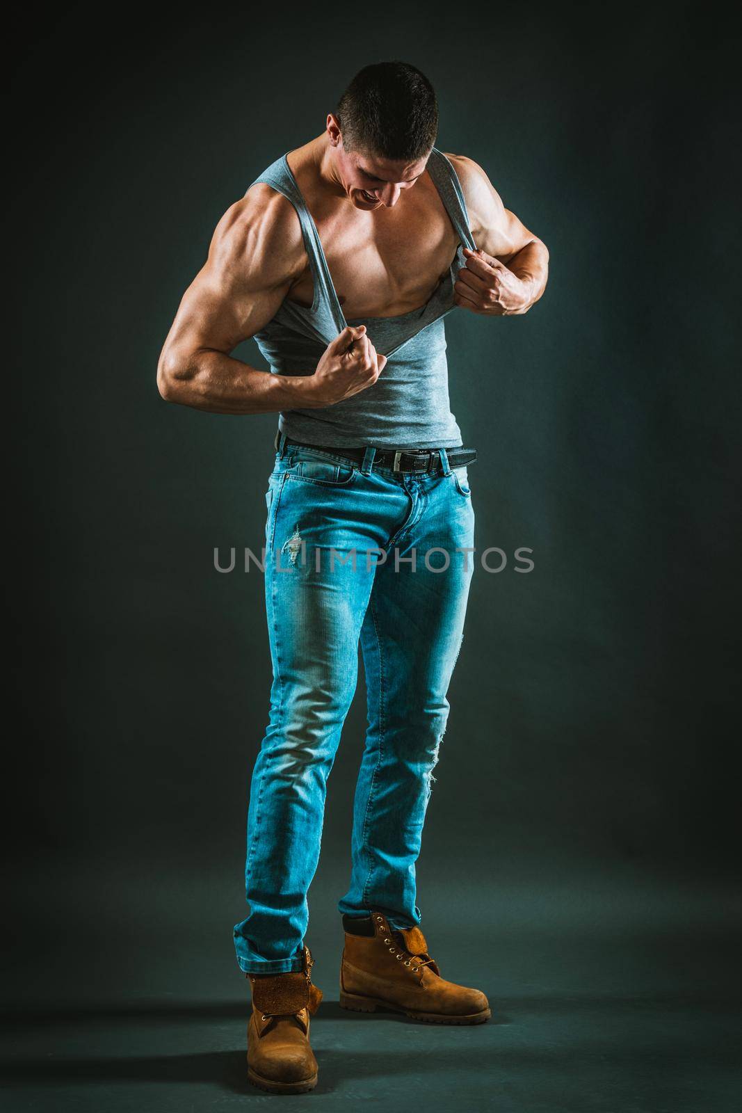 Muscular Male Ripping Shirt by MilanMarkovic78