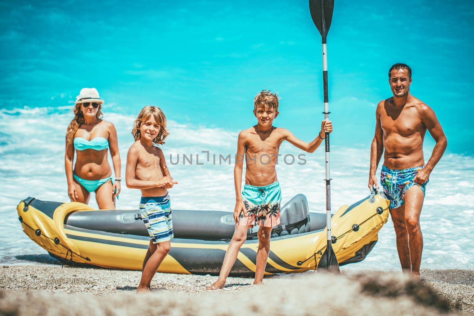 Rubber kayak is prepared for happy family sailing at the beach. 