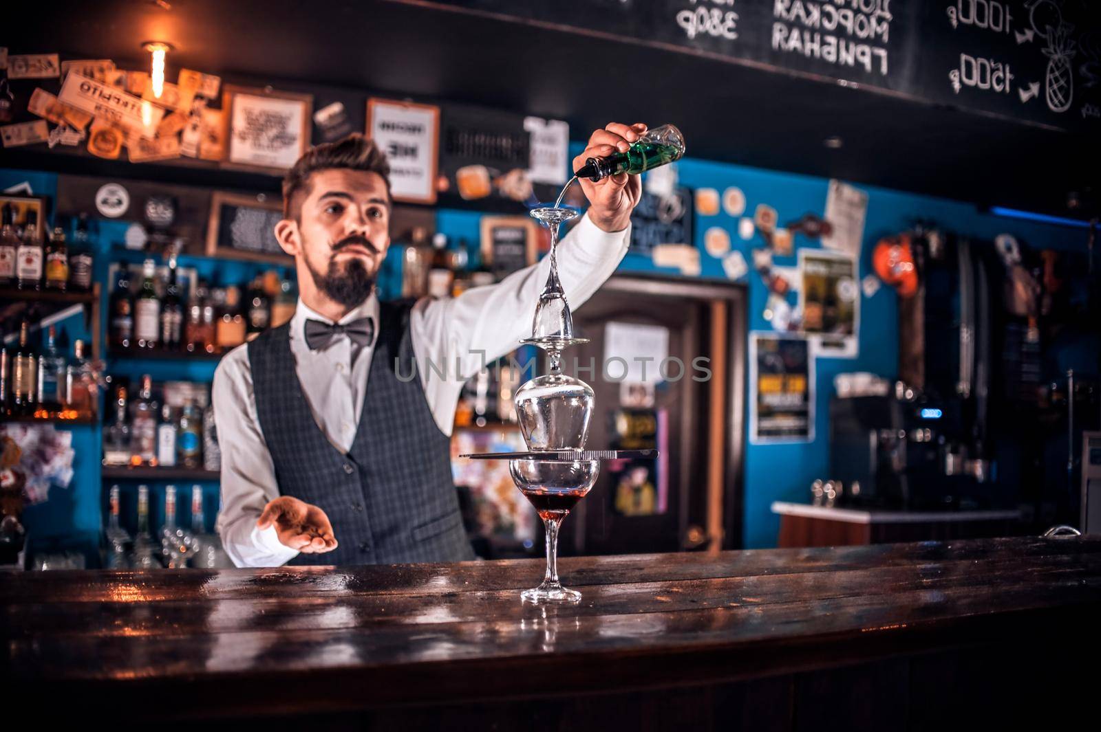 Barman concocts a cocktail in the beerhall