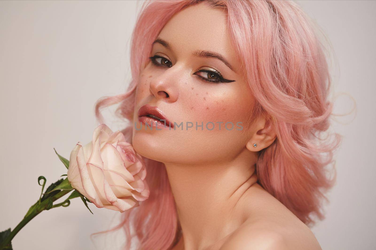 Soft-Girl Style with Trend Pink Flying Hair, Fashion Make-up. Blond Woman Face with Freckles, Blush Rouge, Rose Flowers by MarinaFrost