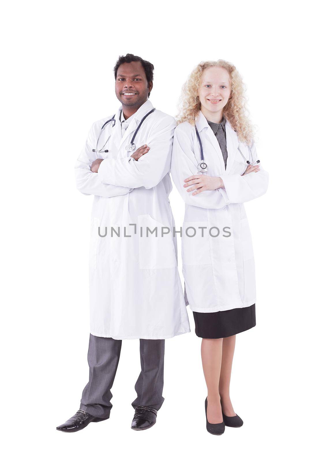 Full body portrait of two happy smiling young medical people, isolated over white background
