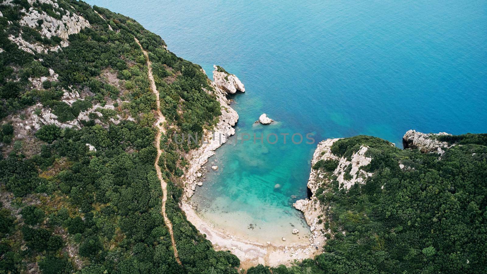 Aerial view of Porto Timoni beach and pirate bay on Corfu island in Greece by driver-s