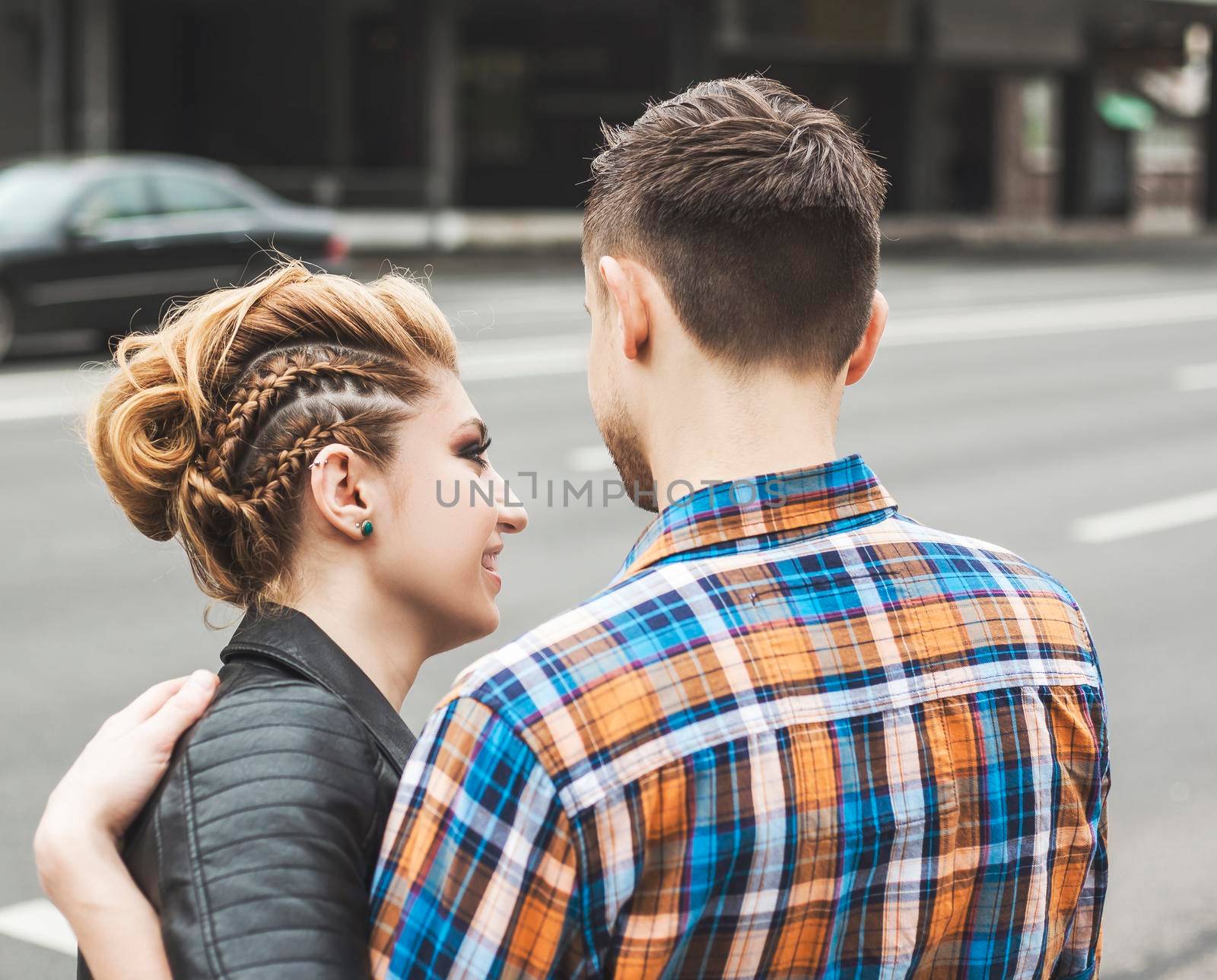 modern loving couple on a walk through the streets of the city by SmartPhotoLab