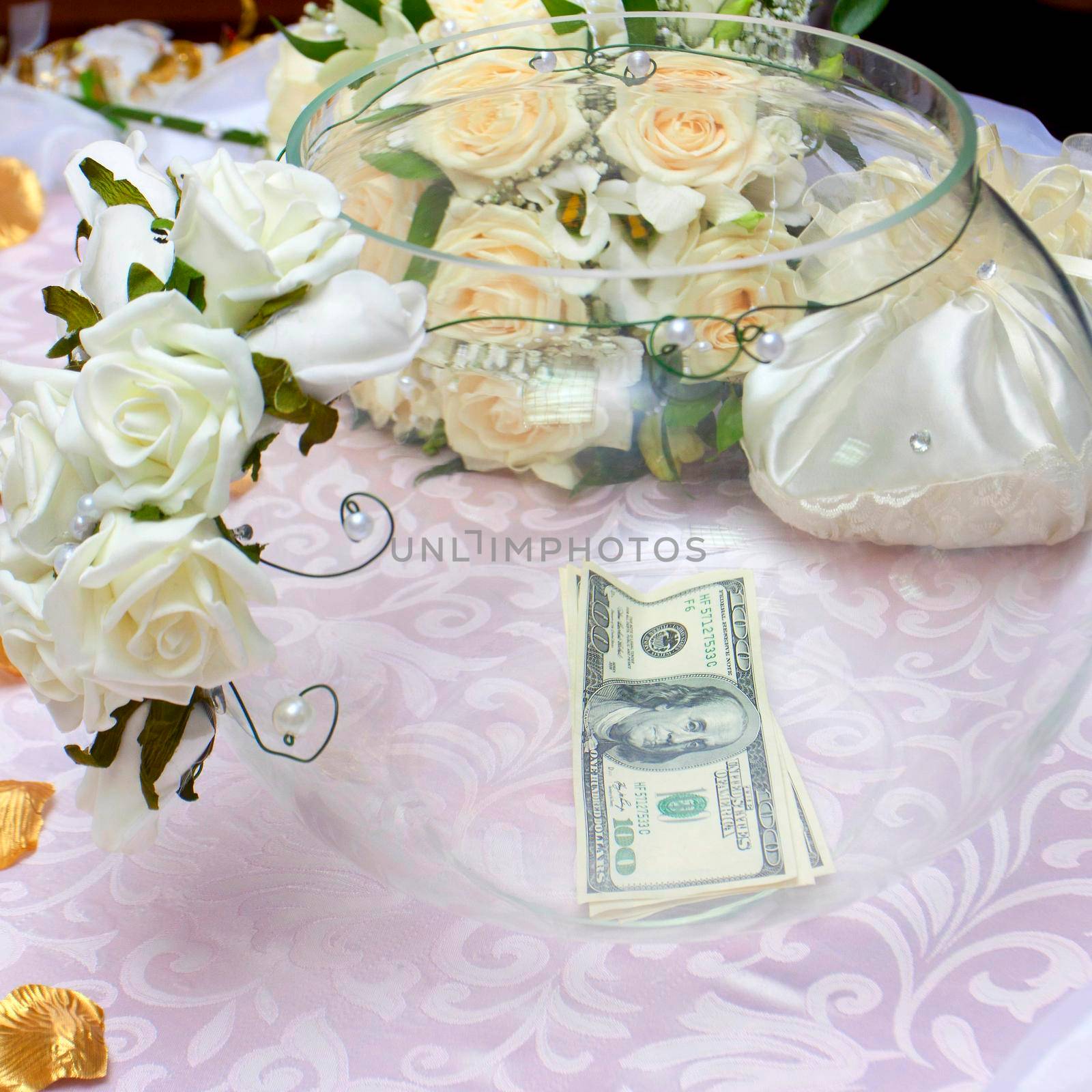 Money in a festive vase, a gift to the wedding