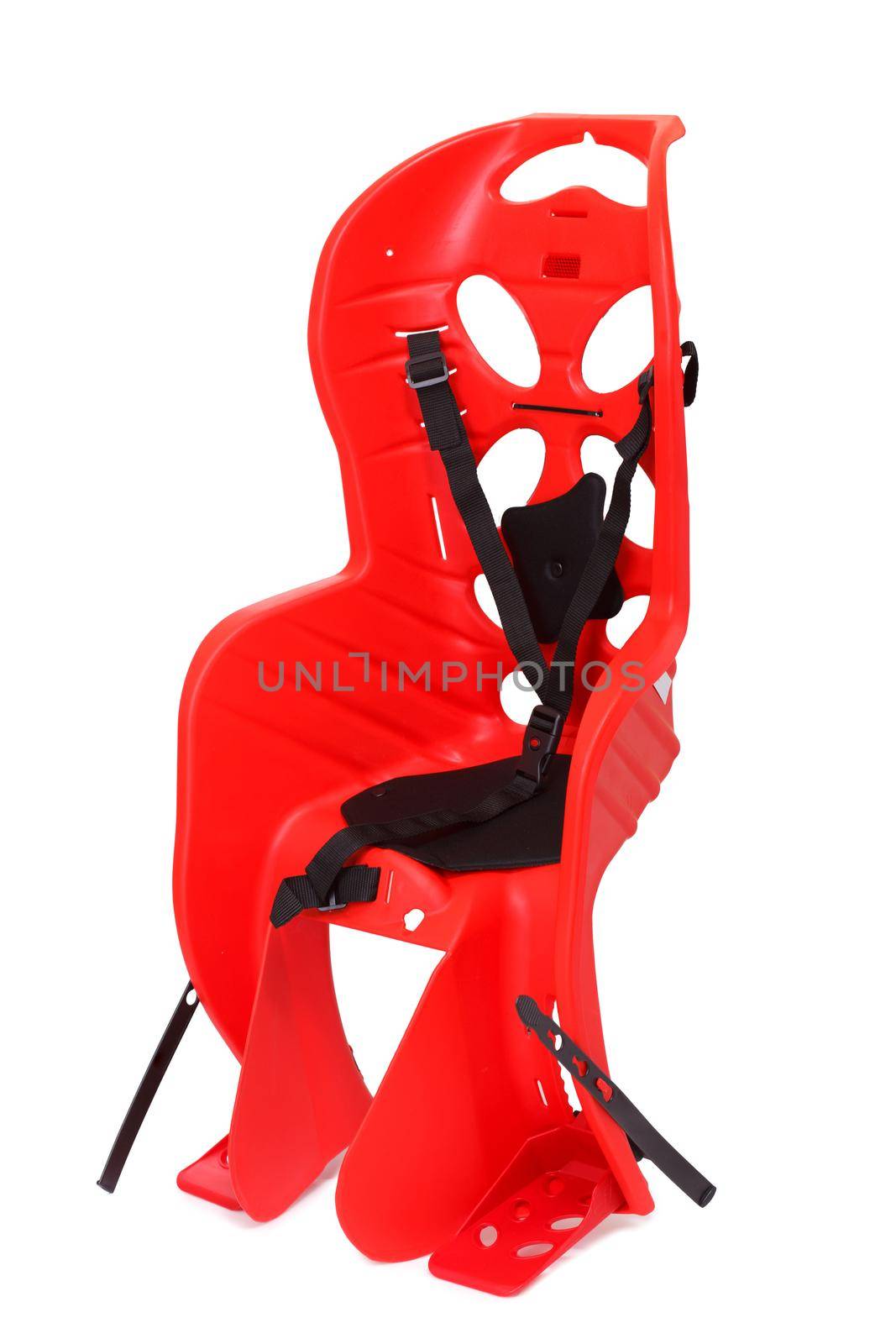 Red bicycle chair for children isolated on white. Family safety sport activity concept.