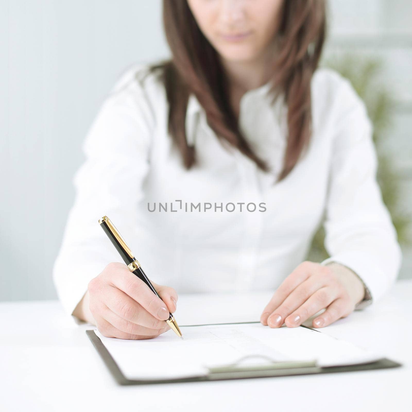 modern business woman working with documents in the workplace in the office