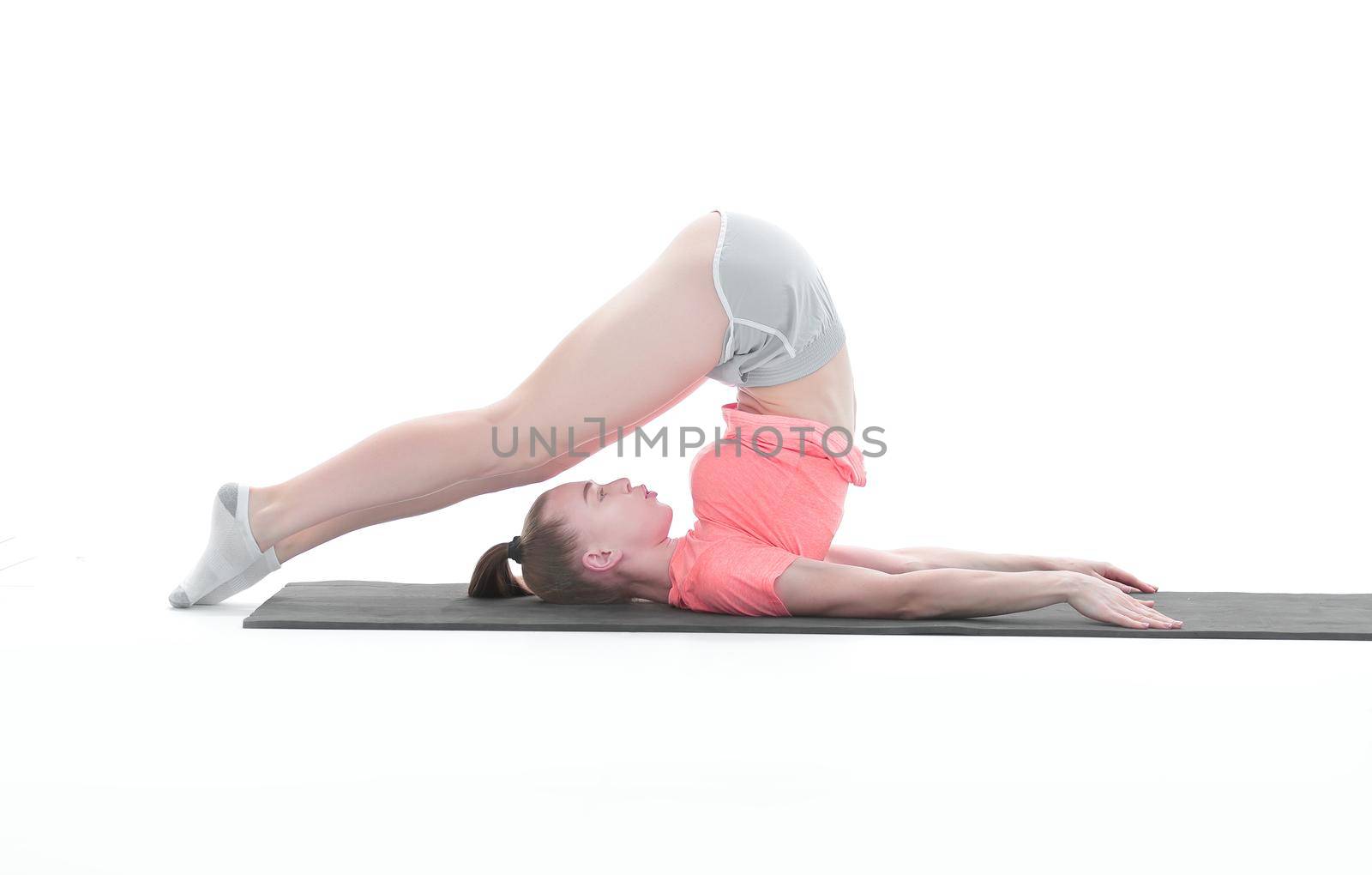 attractive fitness woman performing exercise.photo with copy space.