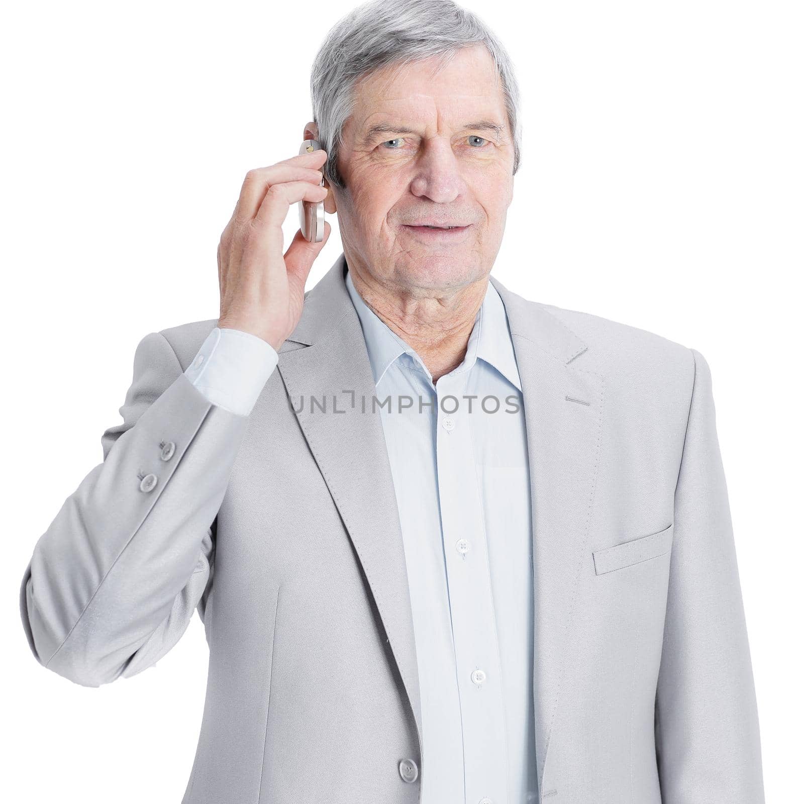 confident senior businessman with mobile phone.