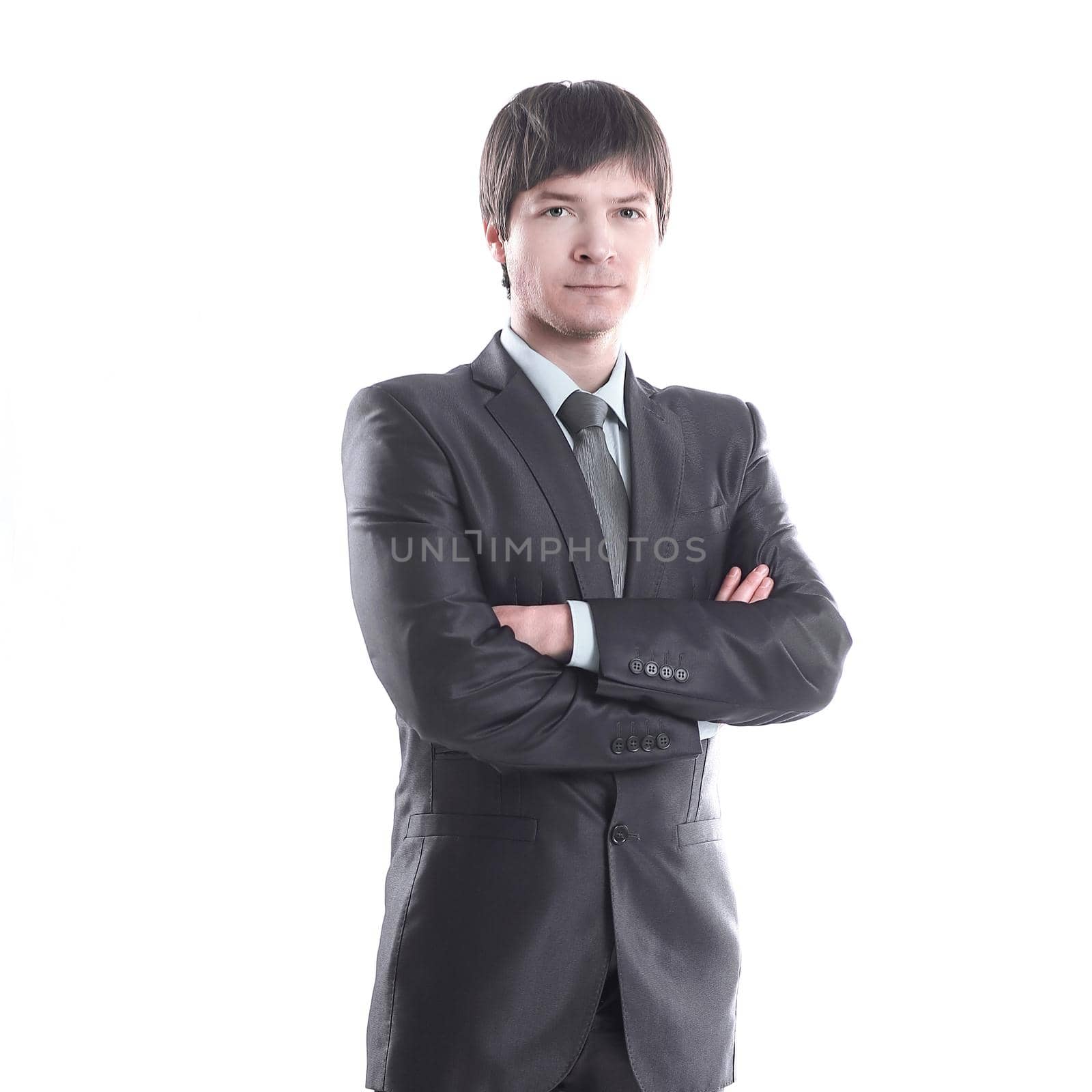 in full growth.portrait of a handsome businessman .isolated on white background.