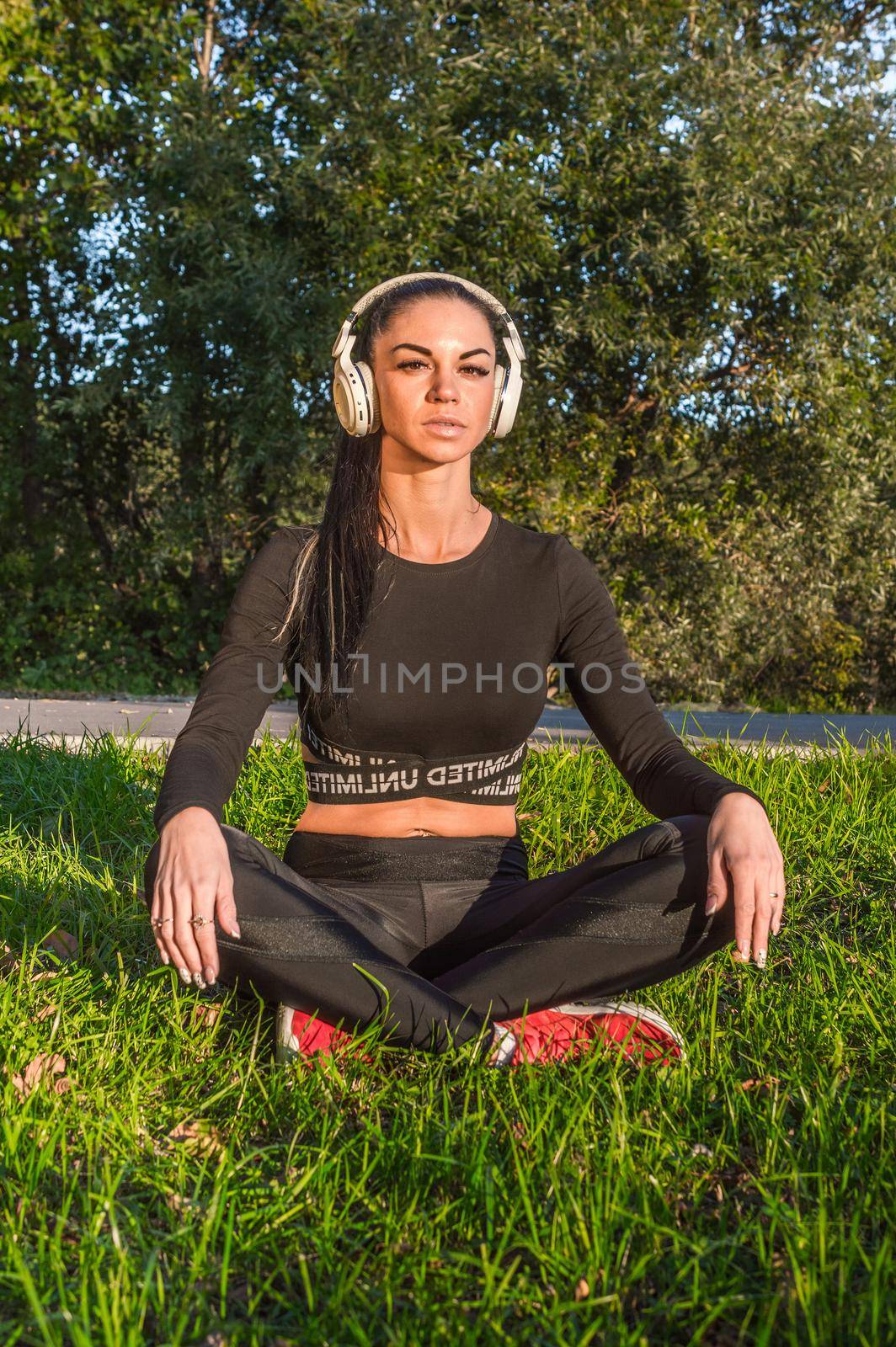 Girl - music lover lying and relaxing with headphones./Pretty young woman in headphones listening to music.
