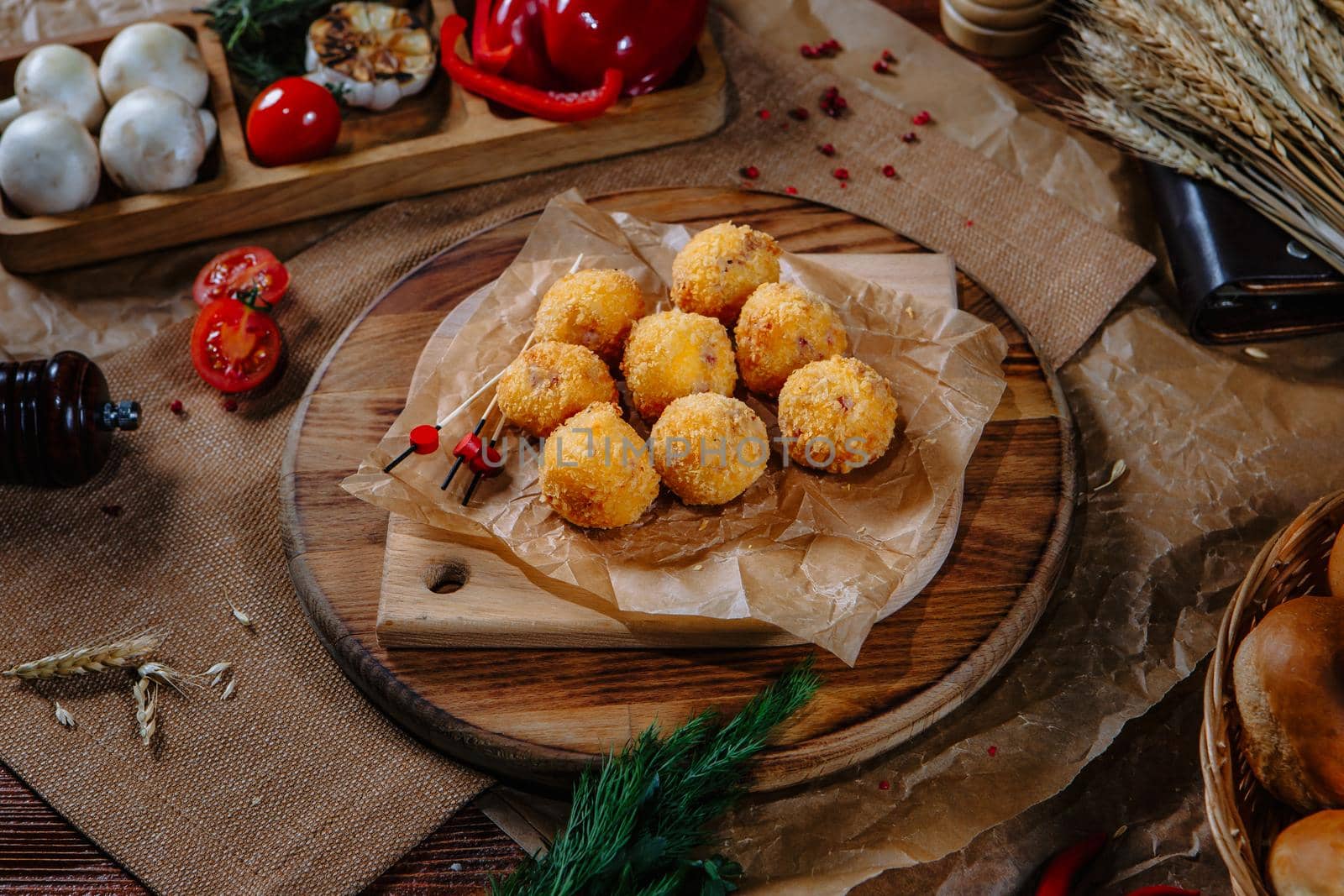 Multiple breaded cheese balls lying on the restaurant table. Top view by deandy