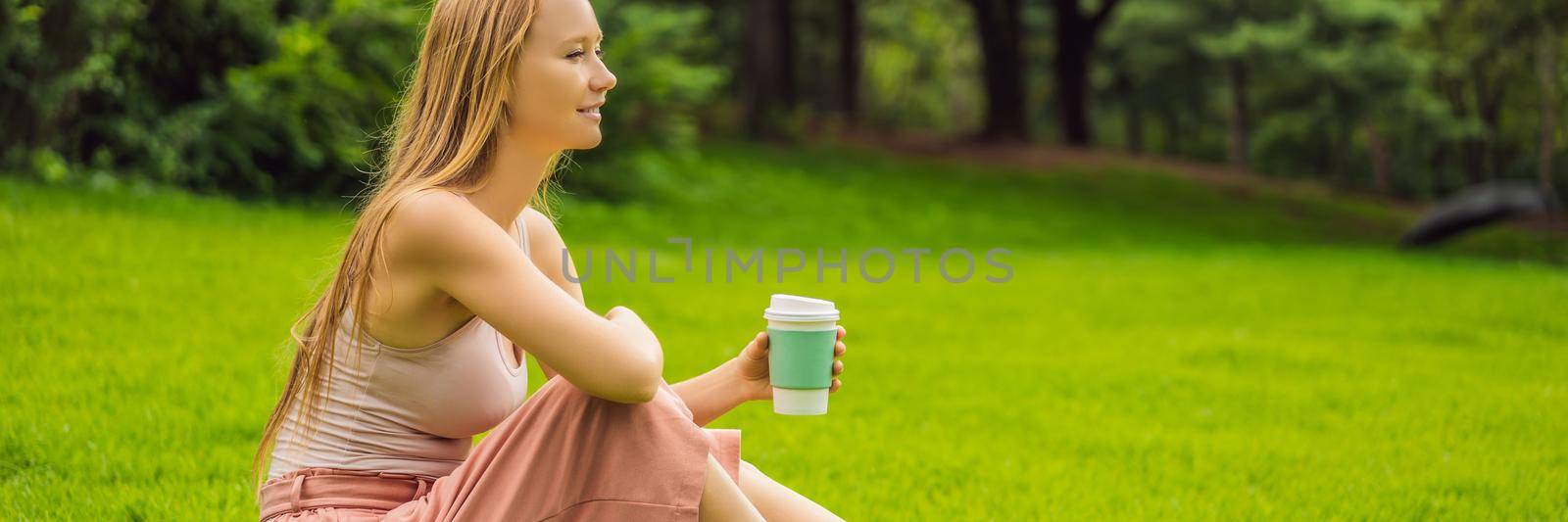 Dreamy young woman having a cup of coffee outside BANNER, LONG FORMAT by galitskaya