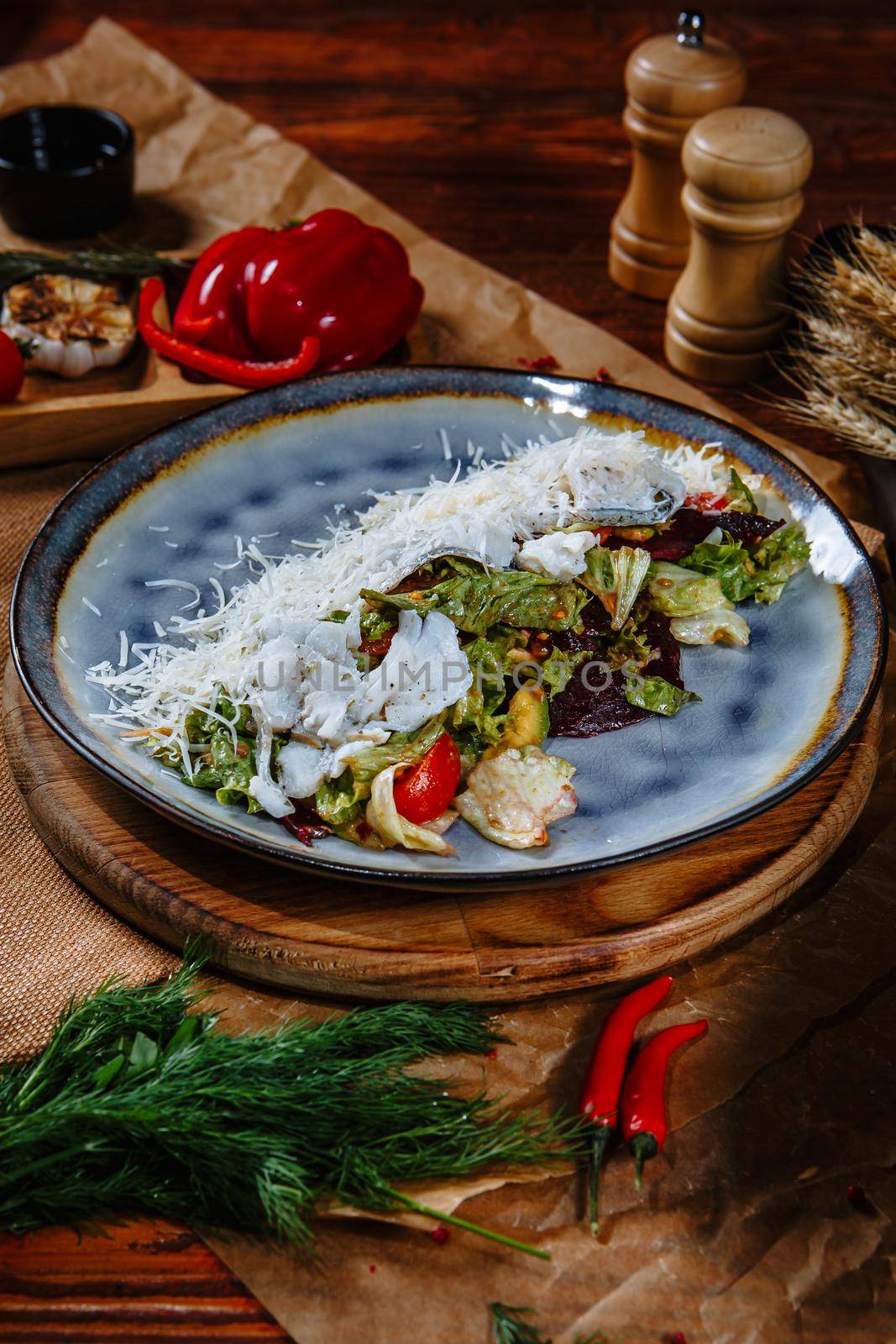 Salad of green and cheese leaves. Lightly fried vegetables, top view by deandy