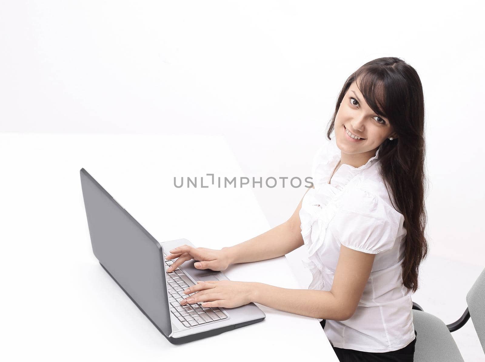 young woman typing text on laptop keyboard.isolated on white background