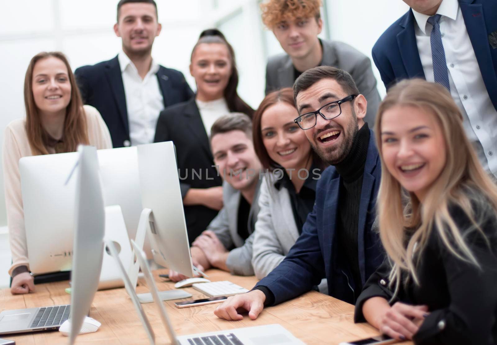 large group of employees in the workplace in the office. photo with copy space