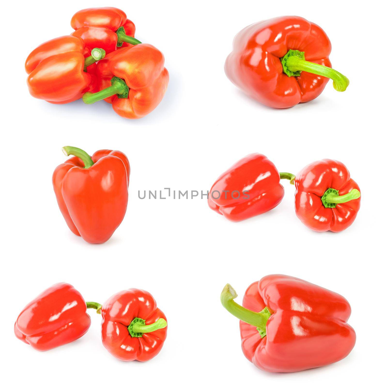 Collection of red sweet peppers on white