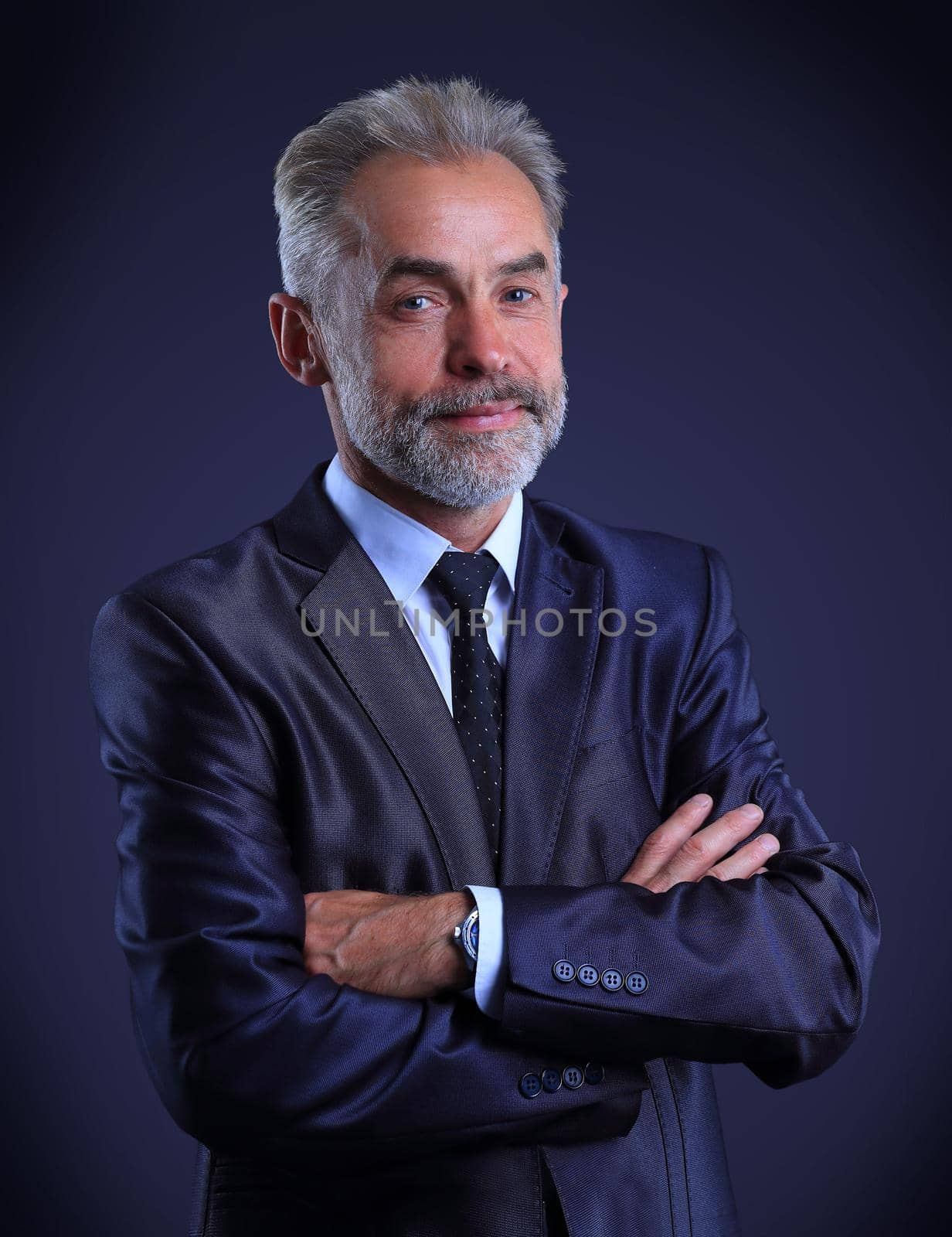 Portrait of adult business man isolated over dark background