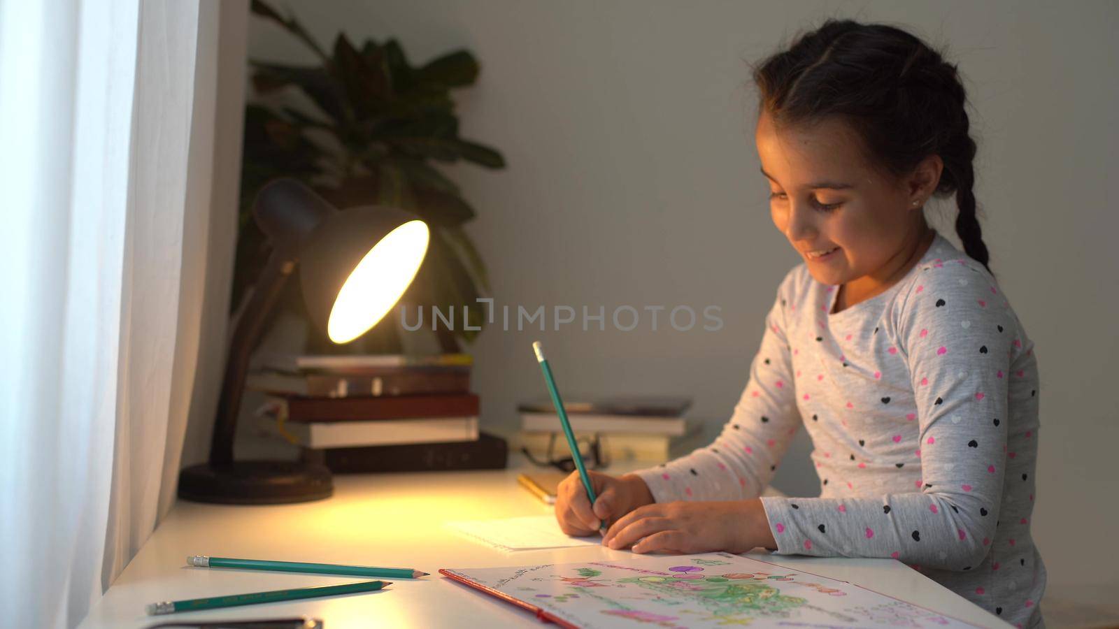Cute smart primary school child girl learning writing doing math homework sit at home table, adorable pretty little preschool kid studying alone making notes, children elementary education concept by Andelov13