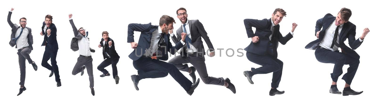 in full growth. two cheerful dancing business people. isolated on white background.