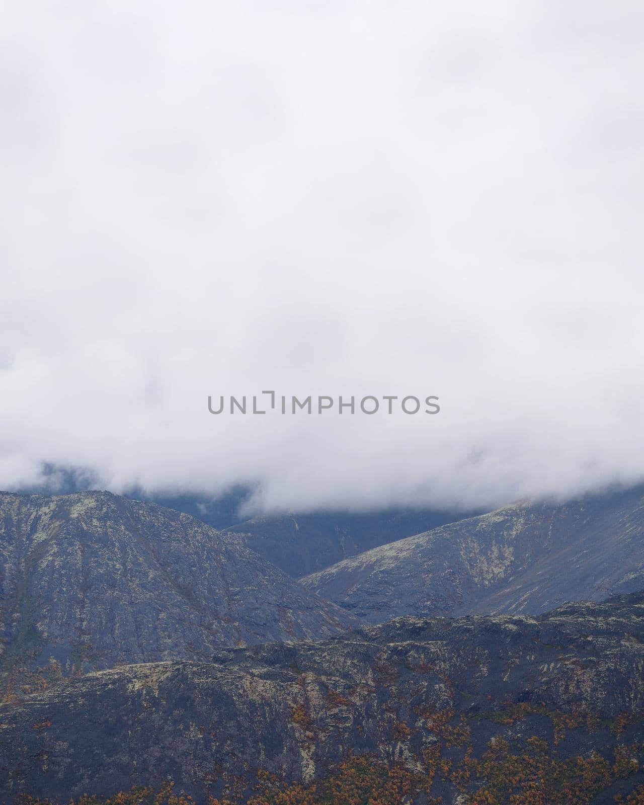 The clouds caught on the tops of the mountains. Low clouds in the mountains. Khibiny, Russia. by Andre1ns