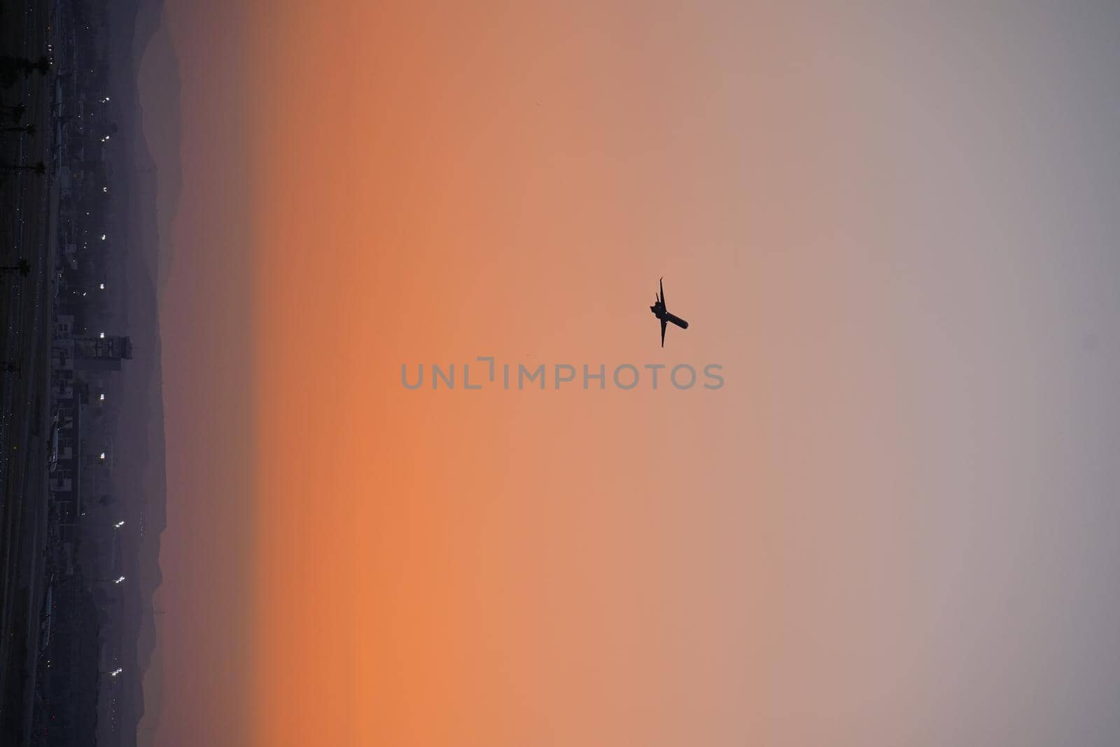 airplane silhouettes isolate on a red background at sunset. high quality photo