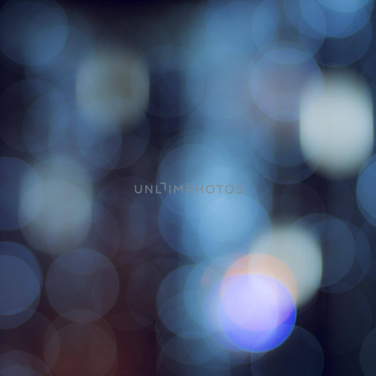 Abstract circular bokeh background of Christmaslight. photo by Andre1ns